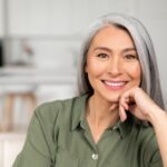 senior gray-haired woman in home interior