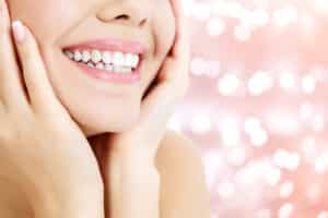 Close-up of woman's attractive-looking teeth after porcelain veneers